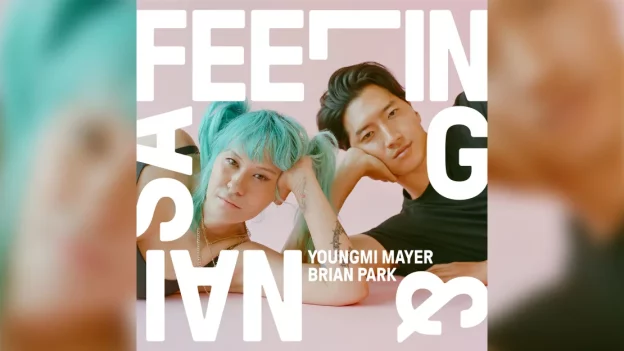 Two people are laying on their sides, heads resting on their hands as they stare at the camera. They are surrounded by the words "Feeling Asian: Youngmi Mayer and Brian Park"